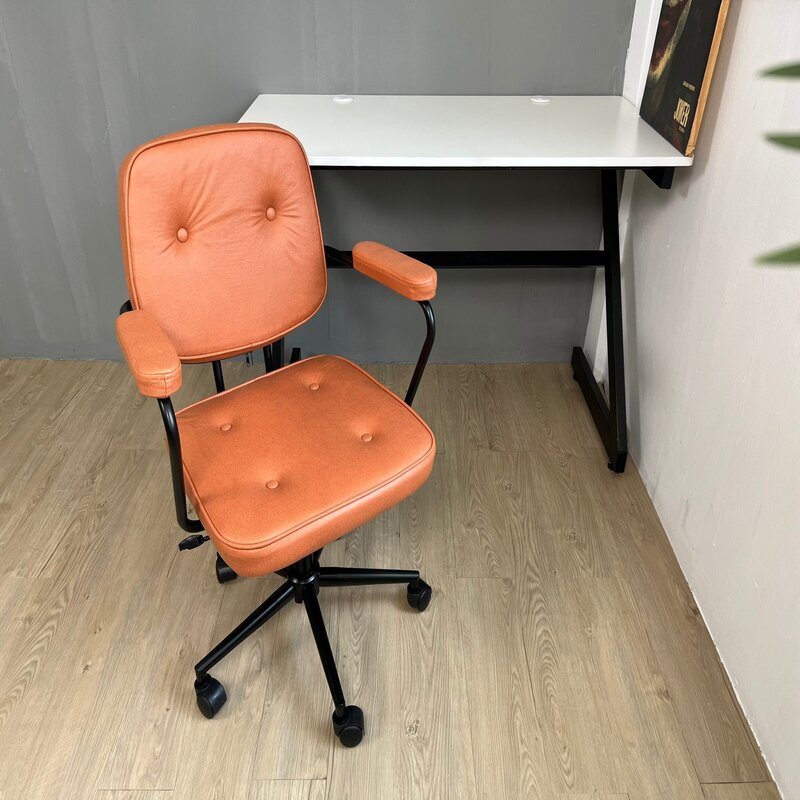 Transparent plastic chair with plated legs